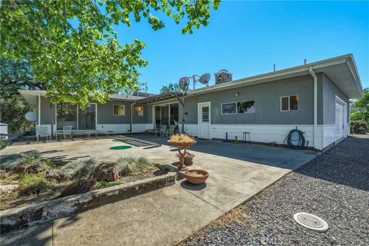 Concrete patio on east side of home