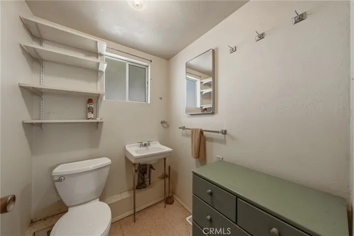 Half bath in attached garage.