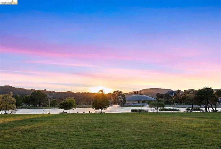 view of property's community featuring a water and mountain view