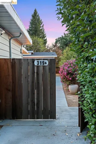 view of gate at dusk