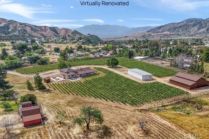 Imagine establishing your own vineyard on 3 1/2 acres of north bench property!  Photo virtually renovated.