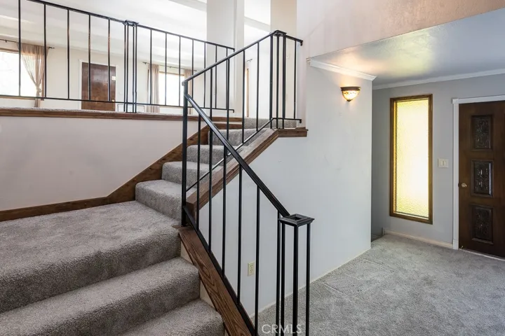 Stairwell to Upper Level.