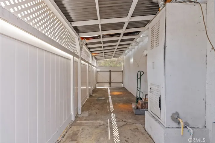 Side Storage by Garage - can also be used as a covered parking spot