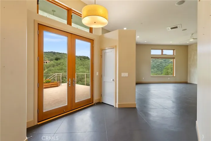 Entryway with convenient coat closet.