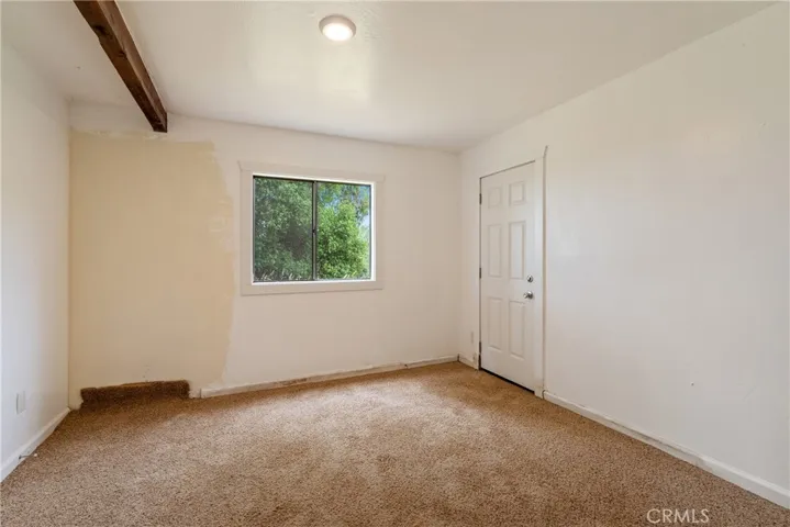 Barn 1, bedroom with door to the outside.