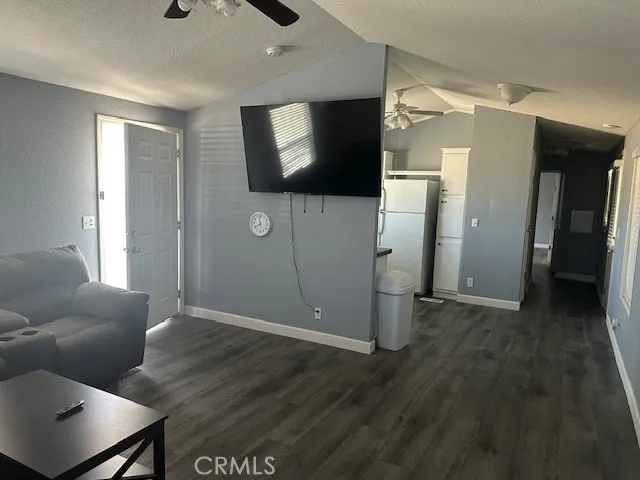 Living room looking toward the kitchen and hallway.