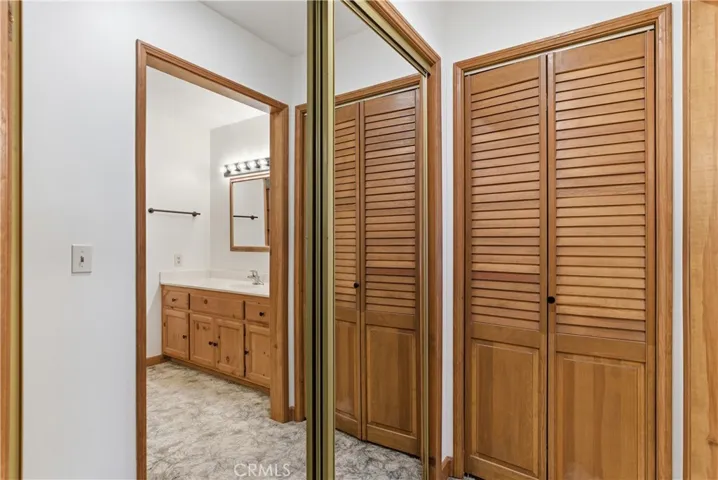 Primary bedroom closet near Master bath