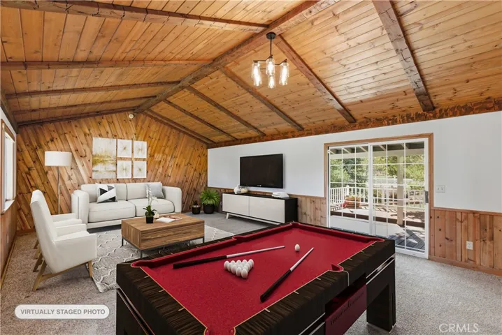 AI Photo of game room, given you ideas of how to layout furniture in this great space.