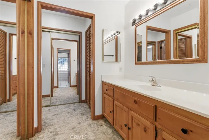 Primary bathroom with 2 closets.