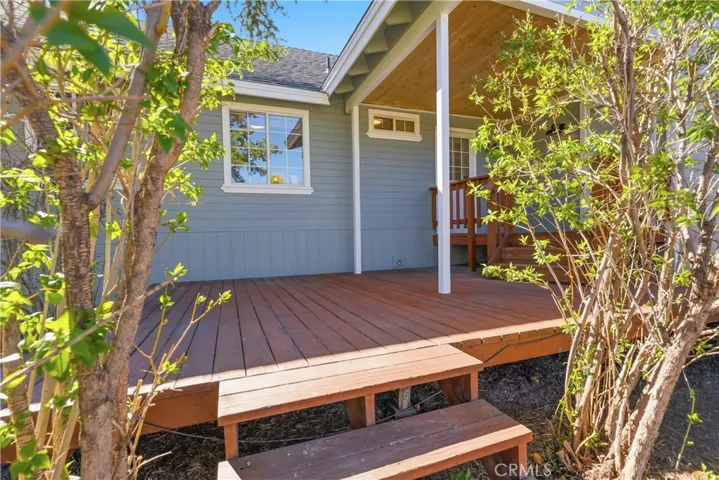 Backyard covered porch and deck.