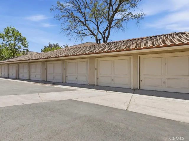 One car detached garage and assigned parking space included