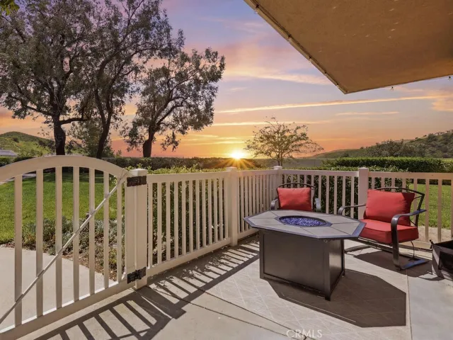 19801 Meadow Ridge with panoramic view and coveted location. Sunset digitally enhanced.