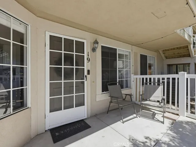 Private front patio with vinyl fence/gate
