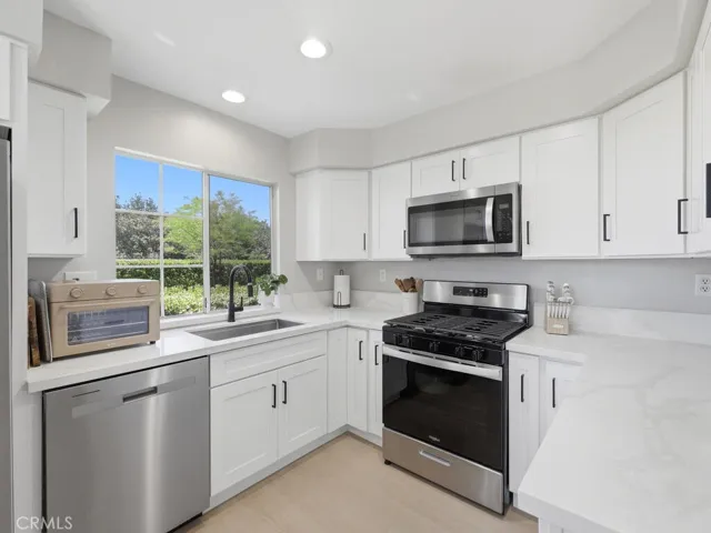 Remodeled kitchen with stainless steel appliances