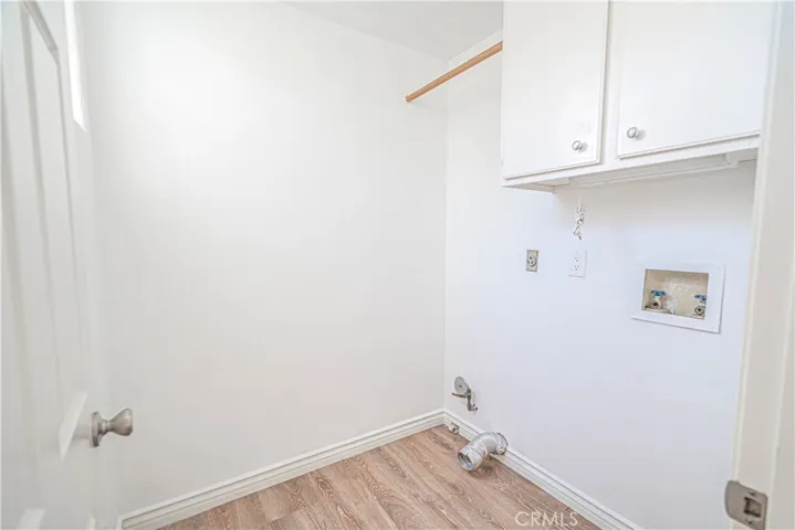 Separate laundry room.