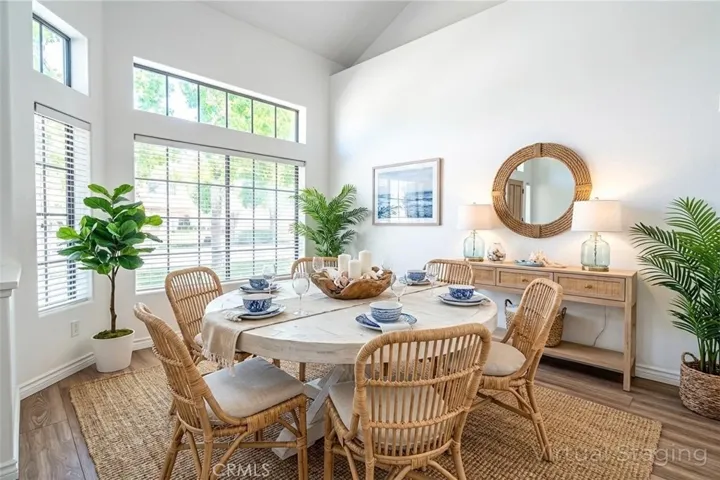 Dining Room, with high ceiling and lots of light, virtually staged