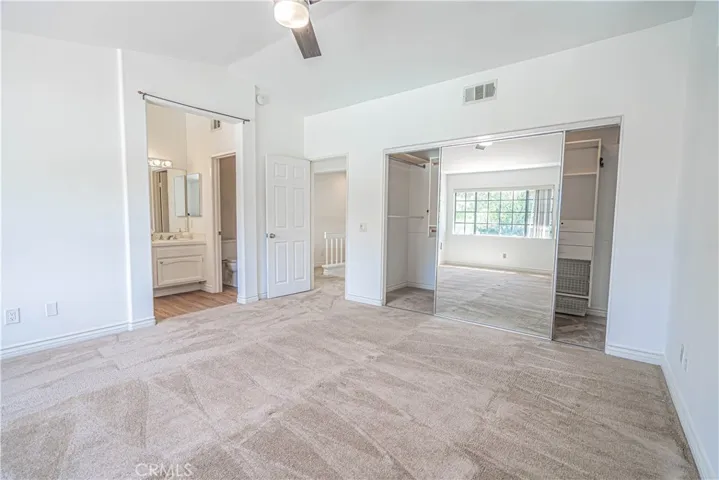 Primary Bedroom, ensuite and walk in closet.