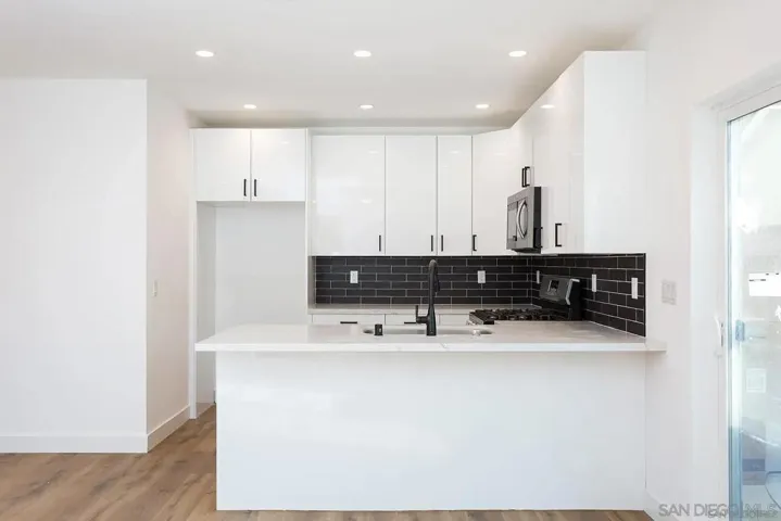 (shown without a fridge, but the home does include a fridge)