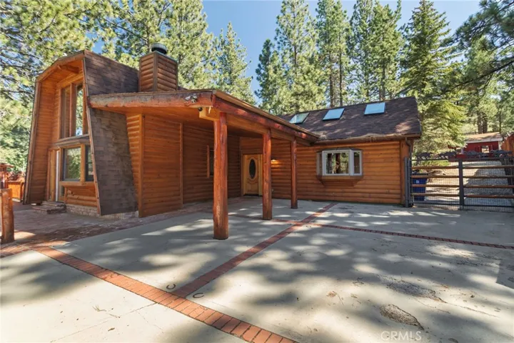 Home showing carport and access to the barn lots of parking