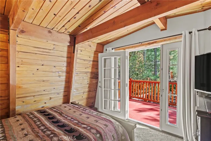 Upstairs bedroom with deck