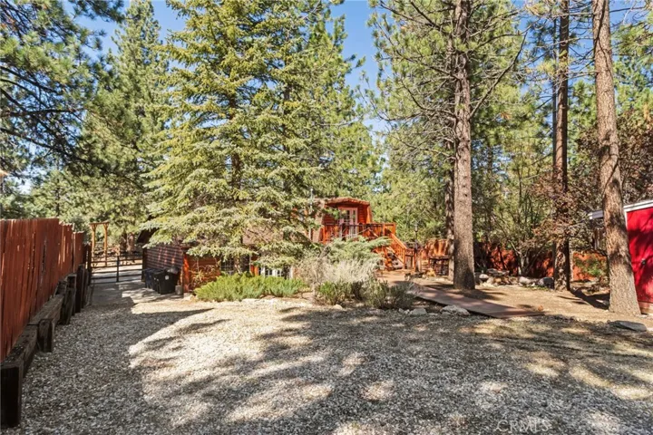 This is the rear of the property from the barn showing the gravel driveway