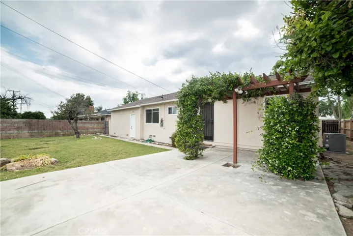 Backyard with covered patio