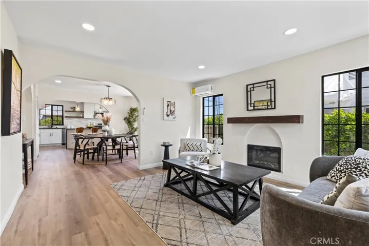 Family room with dining room in the background, and kitchen beyond that