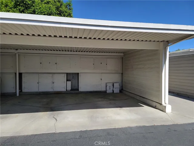 Carport space 8 with upper and lower cabinets.