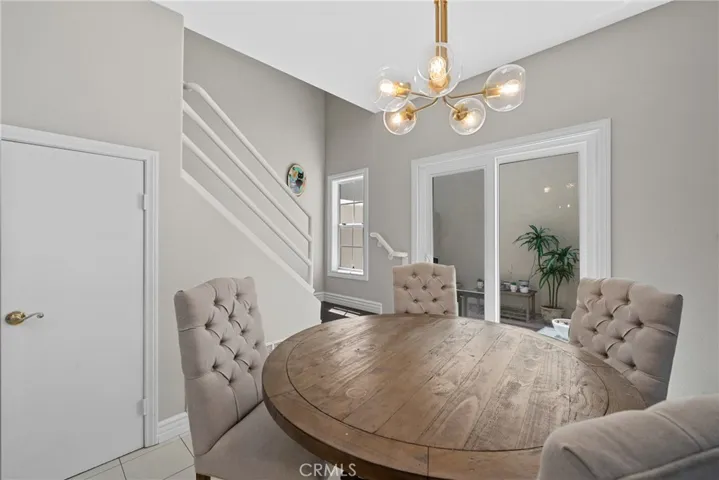 Sliding doors lead from dining to private patio.