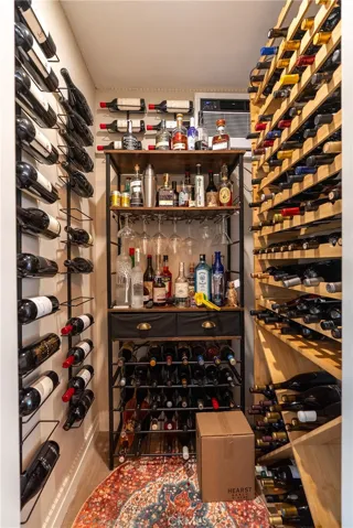 Wine lovers will appreciate the temperature-controlled room just inside