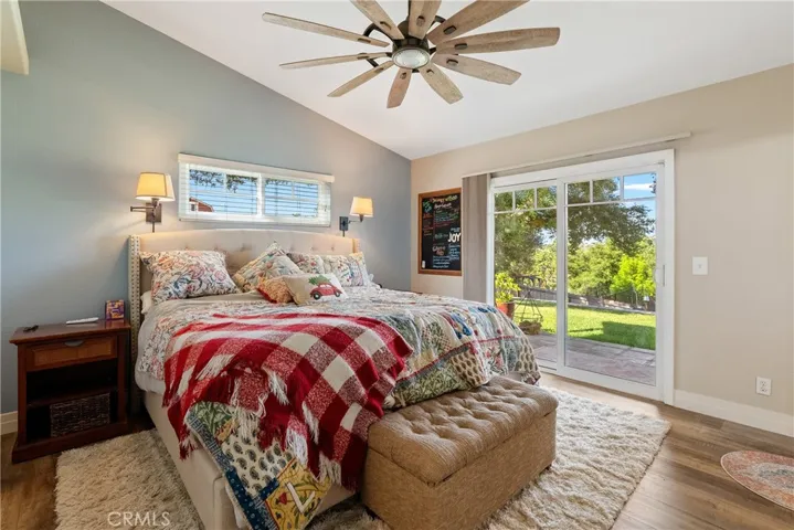 Enjoy backyard access from the primary bedroom’s sliding doors