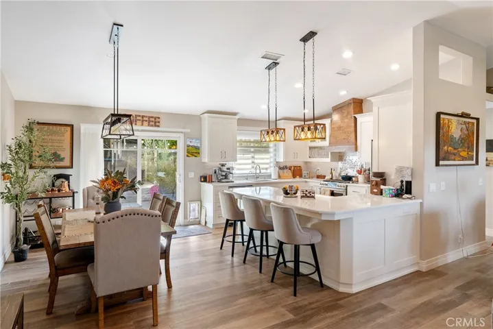 Kitchen and dining area with easy indoor-outdoor access to the backyard