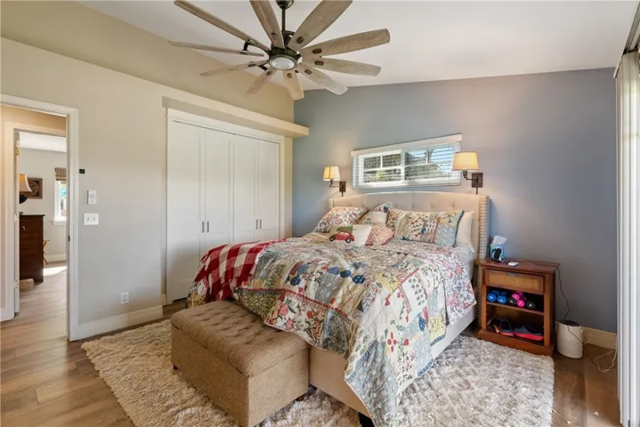 Primary bedroom offers built-in closet organization (not visible in photo)