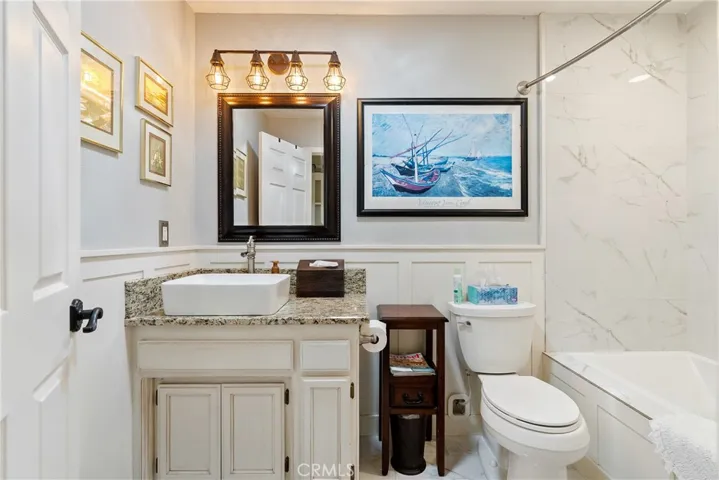 Updated hall bath with modern finishes