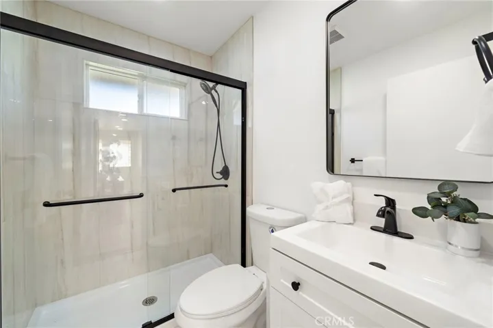 Main-level bathroom with walk-in shower