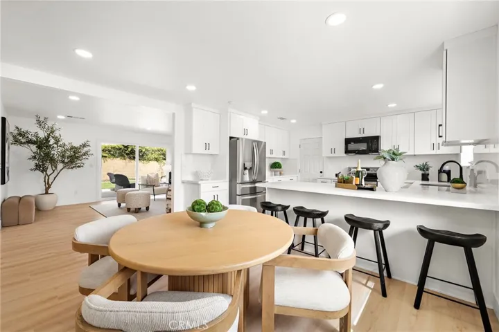 Open dining area with breakfast bar