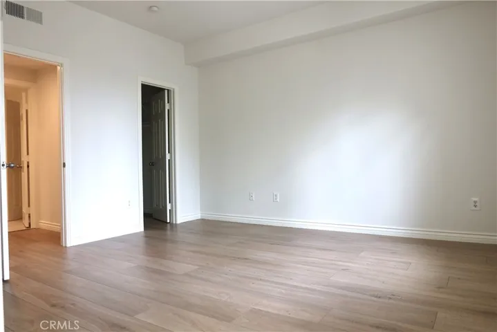Natural light fills the primary bedroom