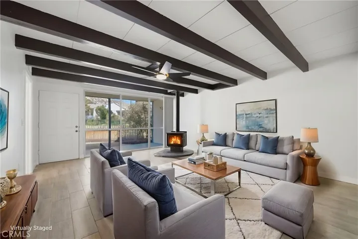 Living room w digitally enhanced virtual staging.