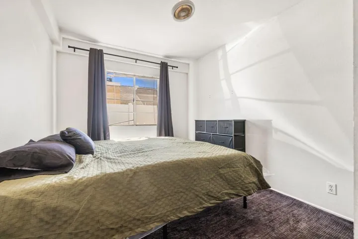 guest room with green bed