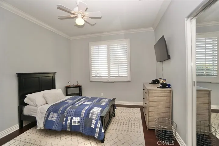 4TH BEDROOM UPSTAIRS WITH MIRRORED DOORS