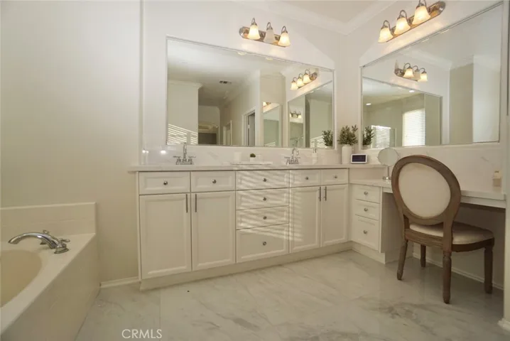 MASTER BATHROOM W/MAKEUP TABLE & PORCELAIN TILE