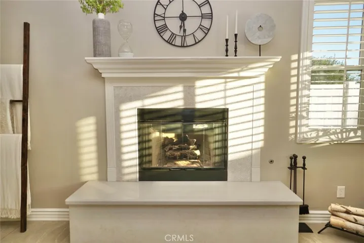 FIREPLACE MARBLE MANTLE IN FAMILY ROOM