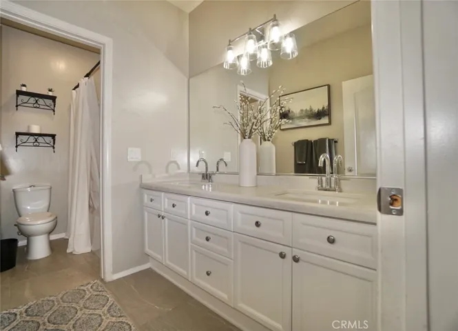 UPSTAIRS SHARED BATHROOM WITH DUAL VANITIES