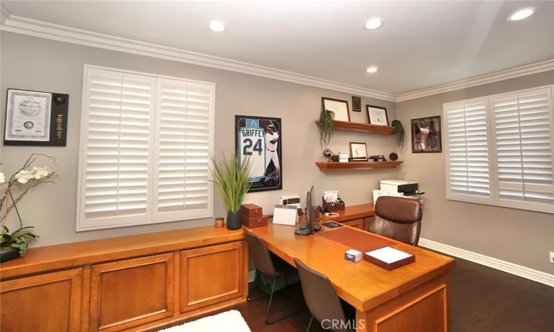 FIRST FLOOR OFFICE WITH PLANTATION SHUTTERS  & ALOT OF RECESSED LIGHTS