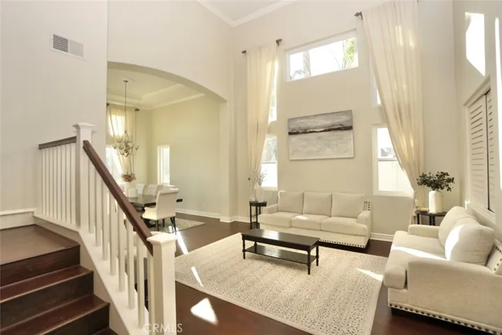 DOUBLE VOLUME CEILING IN FORMAL LIVING ROOM WITH LOTS OF WINDOWS, BRIGHT AND BREATHTAKING