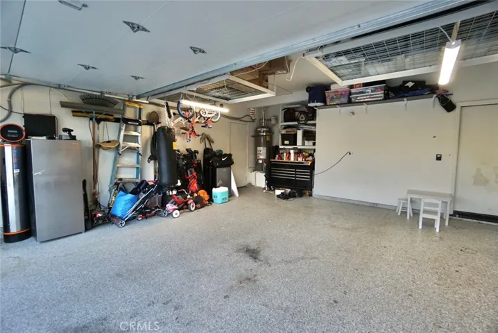 GARAGE WITH EPOXY FLOORING, INSULATED GARAGE DOOR, WATER SOFTENER OWNED!