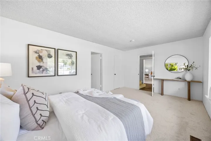 Two ensuite bedrooms provide versatility and privacy.