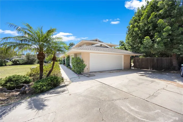 Two-car garage plus generous driveway space—perfect for guests and everyday convenience.