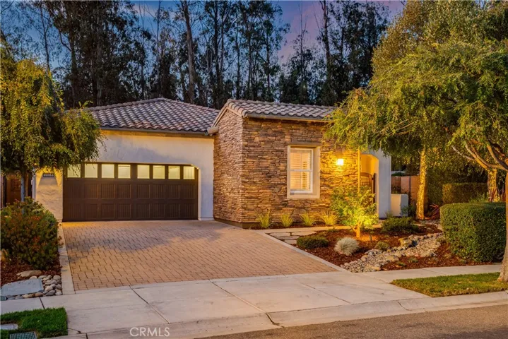 Popular Genova Floorplan with greenbelt, private views.  Large lot.