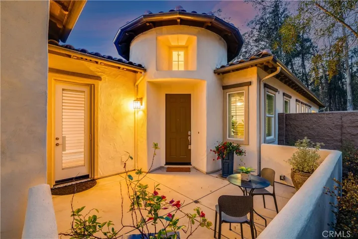 Gated courtyard entry.